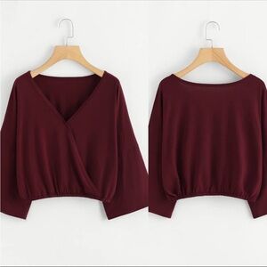 Burgundy Vneck crop top w dolman sleeves. NWOT size small.